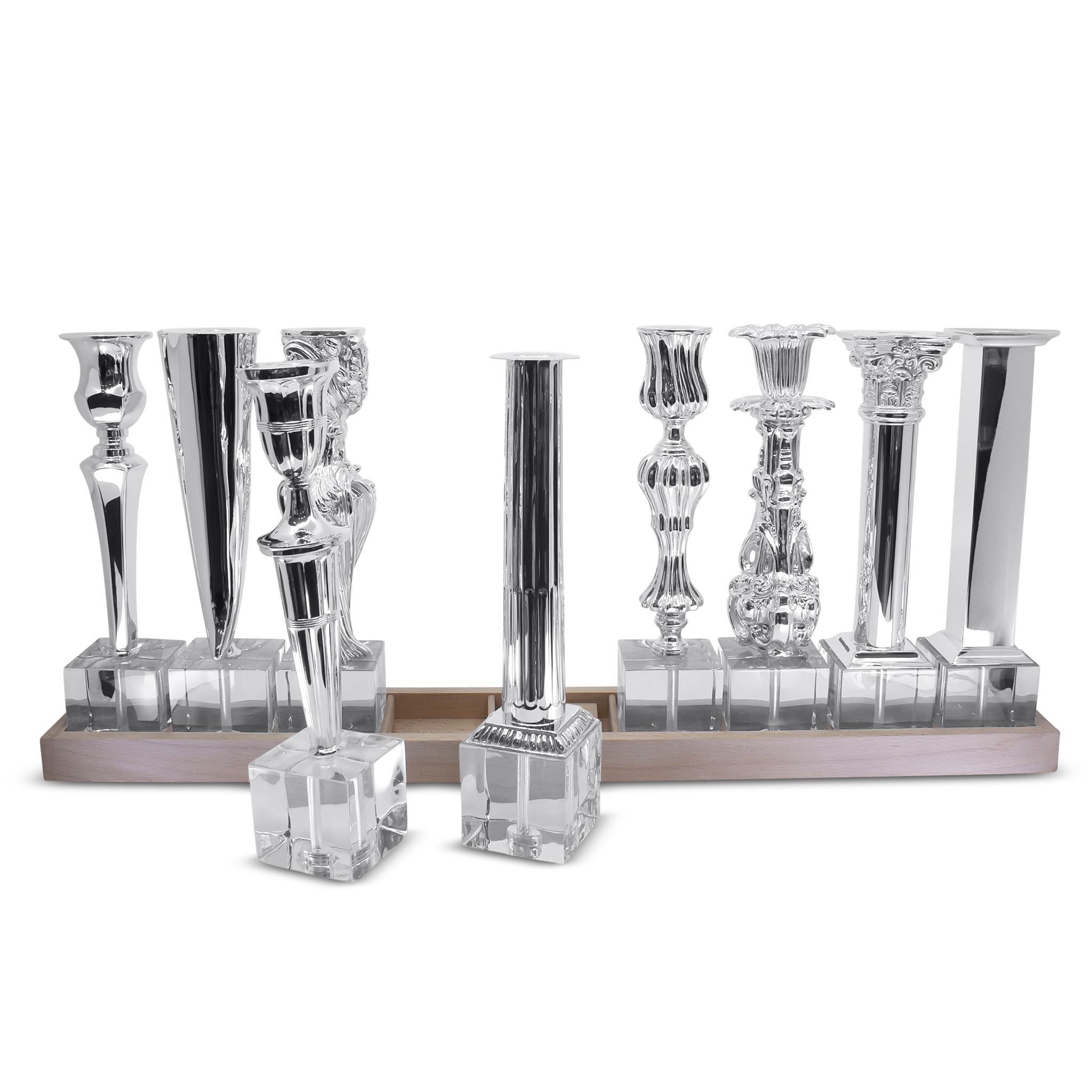 Set of silver candle holders on a white background