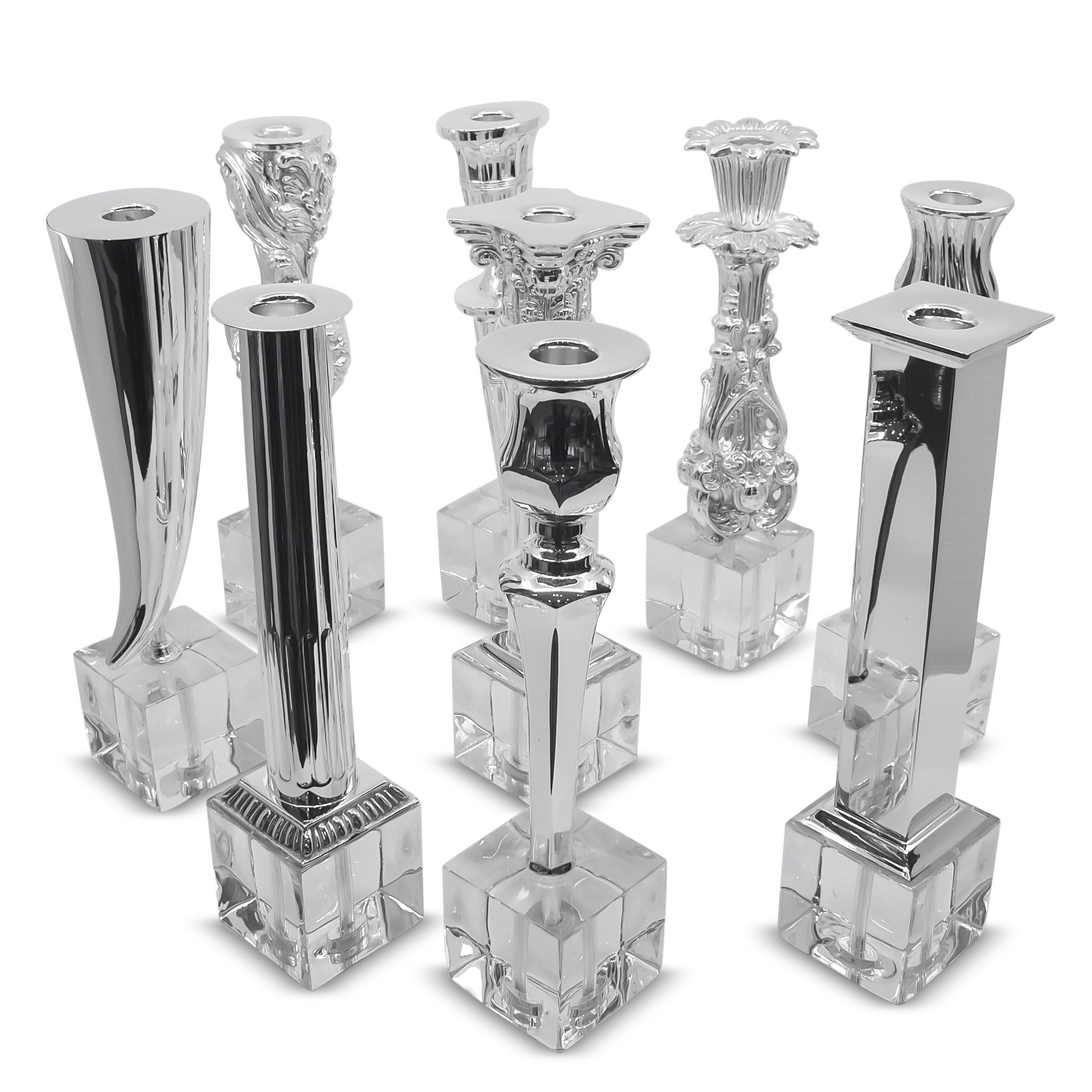 Set of silver candle holders on a white background