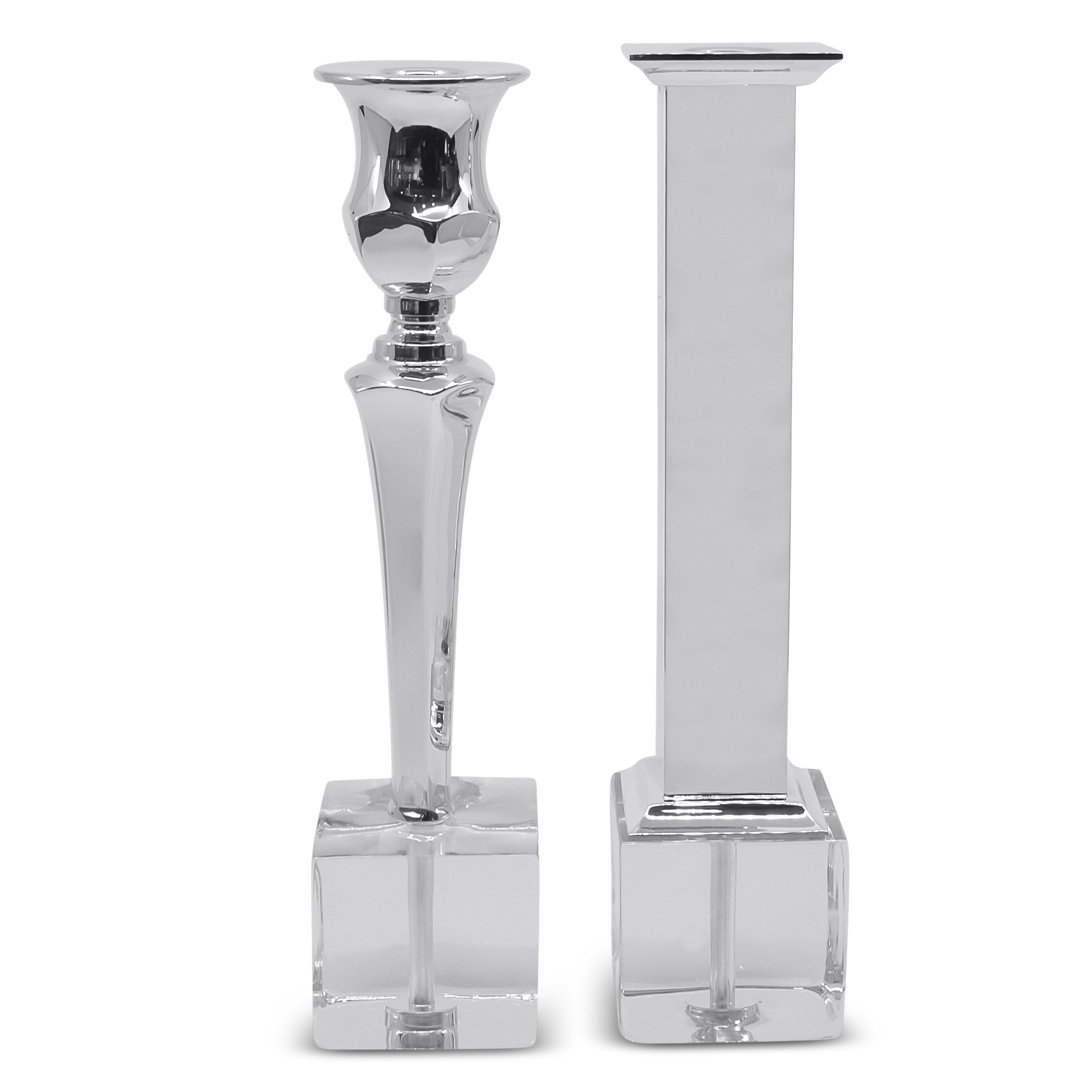 Two silver candle holders on a white background