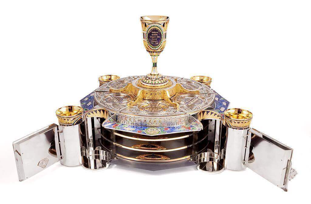 A set of goblets and three floors of plates for the Passover Seder A - Piece By Zion Hadad
