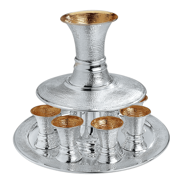 https://thesilverpiece.com/cdn/shop/products/Spotted_Shabbat_Wine_Fountain_8_or_6_guests_-_Piece_By_Zion_Hadad_grande.png?v=1689520869